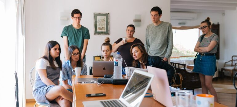 A person teaching a team about CRM use.