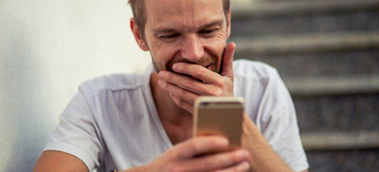 A customer reading an email on their phone.