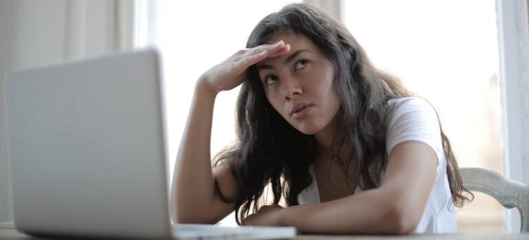 A frustrated person viewing a website.