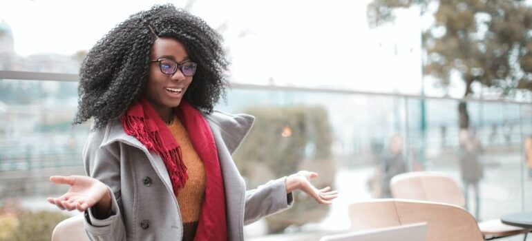 A happy customer looking at a laptop.