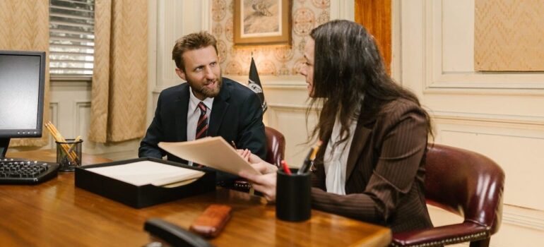 A person consulting with a lawyer.