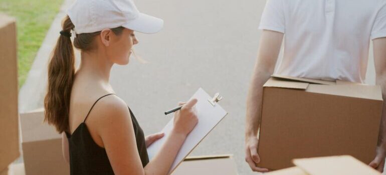 woman writing up inventory