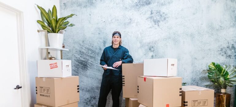 A mover looking at a moving checklist.